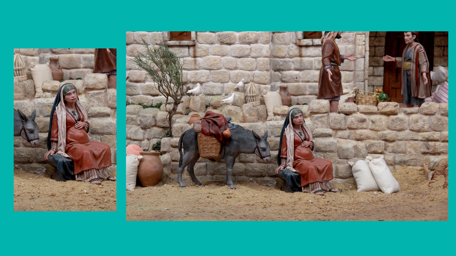 Krippenszene: Ein bepackter Esel steht an einer Mauer.Die schwangere Maria sitzt erschöpft am WEgrand, während Josef nach einer Unterkunft fragt.